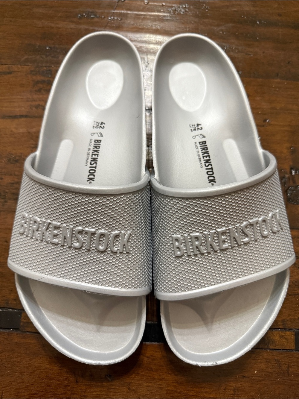 Birkenstock White Slide Sandals with Embossed Logo
